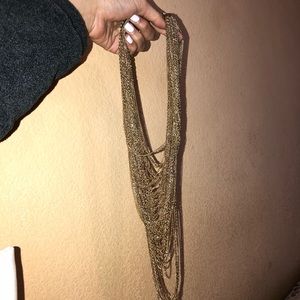 Gold many chains necklace